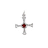 silver St. Cuthbert charm with garnet